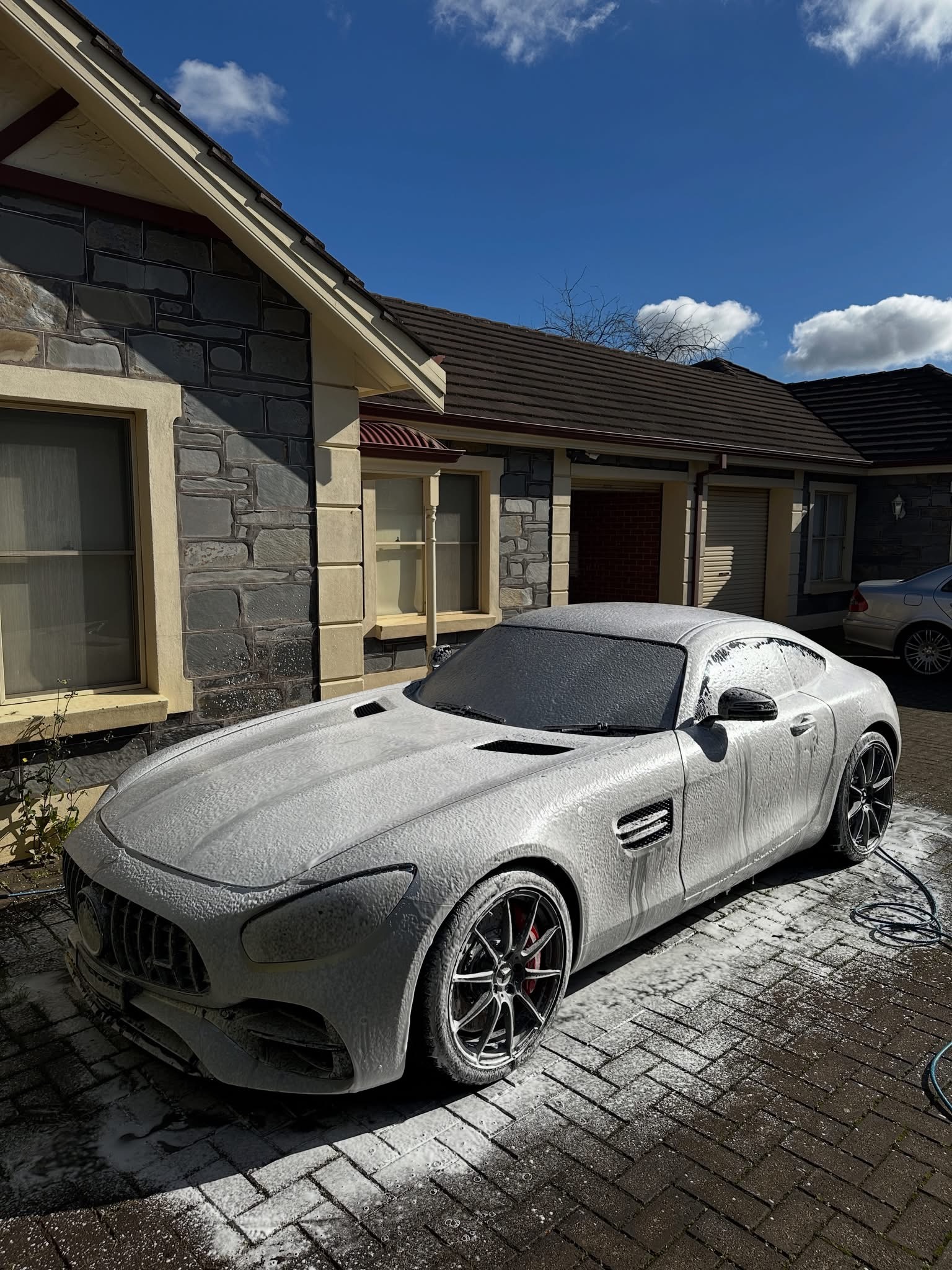 Mercedes-AMG GT covered in snow foam